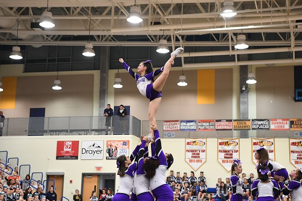 Long Reach cheerleaders support their teammate for a stunt. Photo courtesy of Lifetouch. 