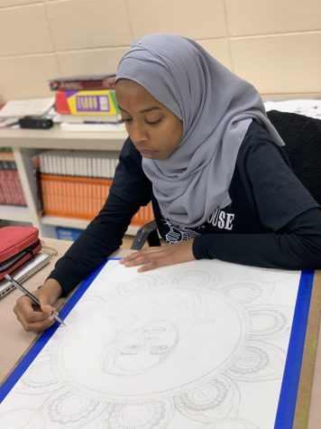 Visual/spatial learner Iman Ahmed completes a self-portrait for her Art II GT class. Photo courtesy of Tori Ely. 