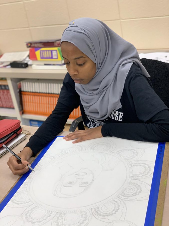 Visual/spatial learner Iman Ahmed completes a self-portrait for her Art II GT class. Photo courtesy of Tori Ely. 